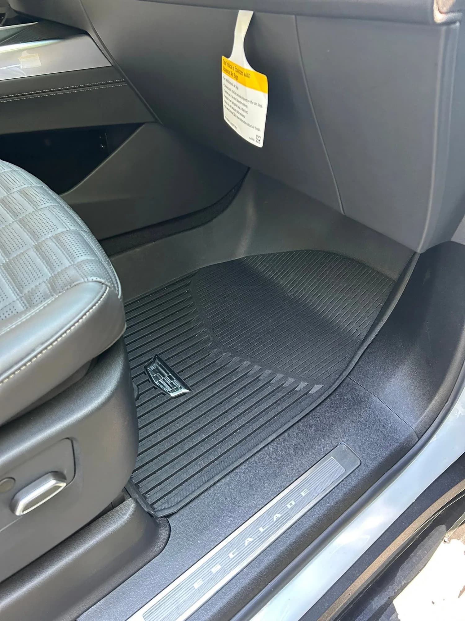 Cadillac Escalade passenger floor mat and doorway